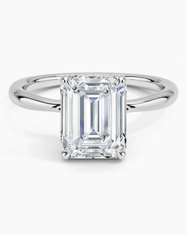 Joss Halo emerald merkez ve halo pırlantalı yüzük